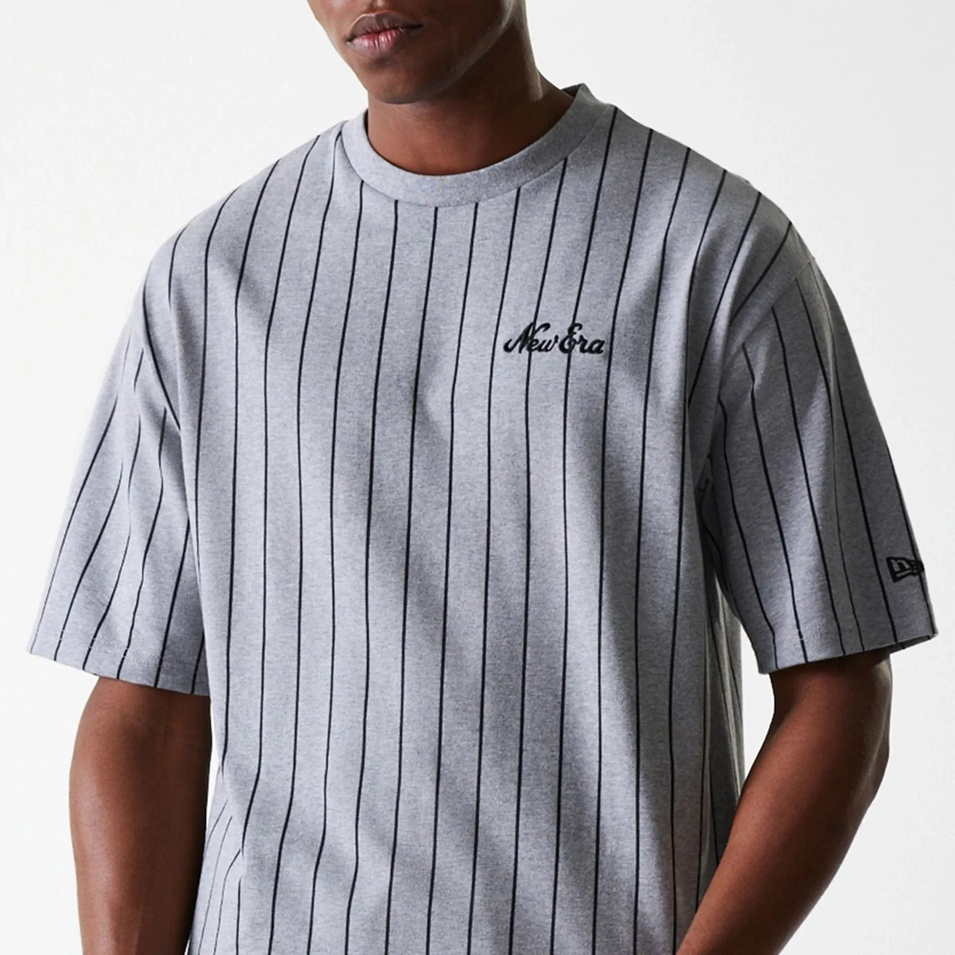 Sustainable Packaging UV protected New Era Pinstripe Pastel Grey Oversized T-Shirt