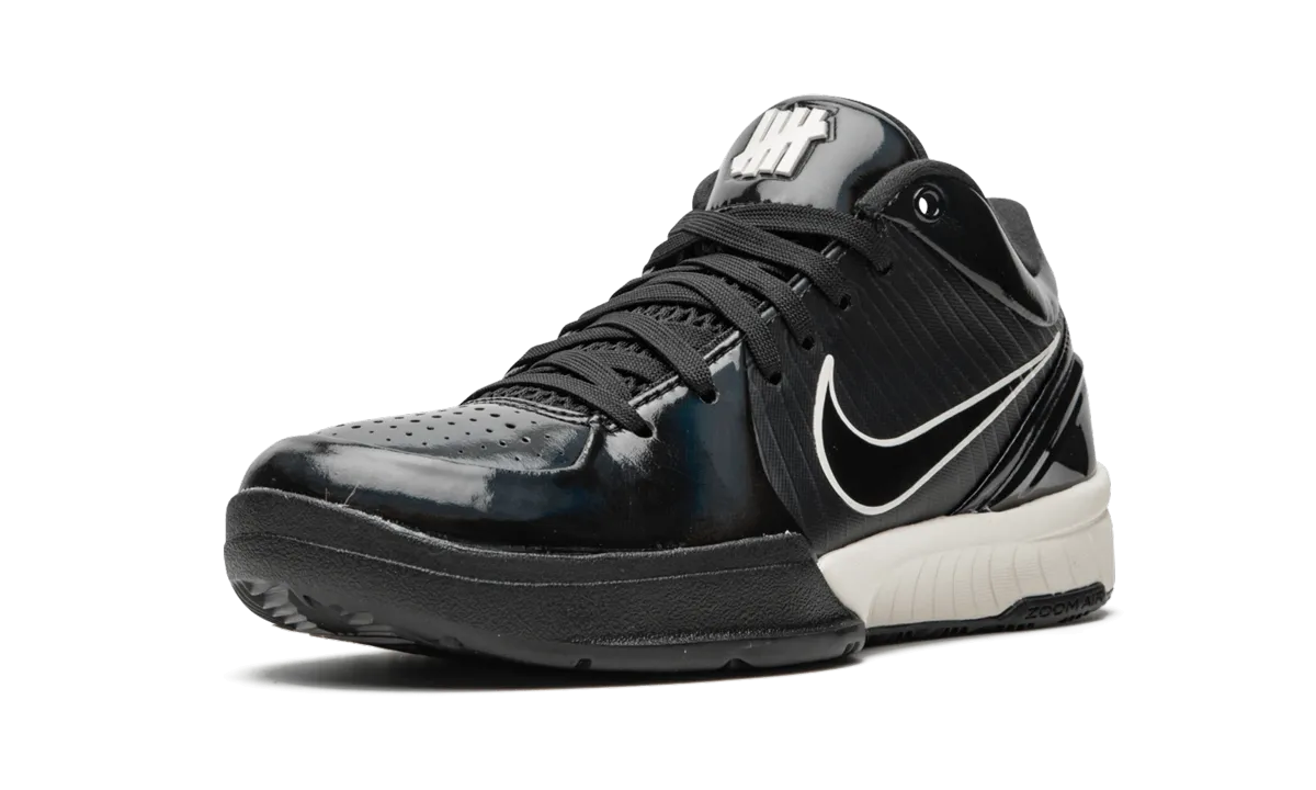 Kobe 4 Protro UNDFTD PE "Undefeated - Black Mamba" running in a bluff area shoes splash - resistant shoes