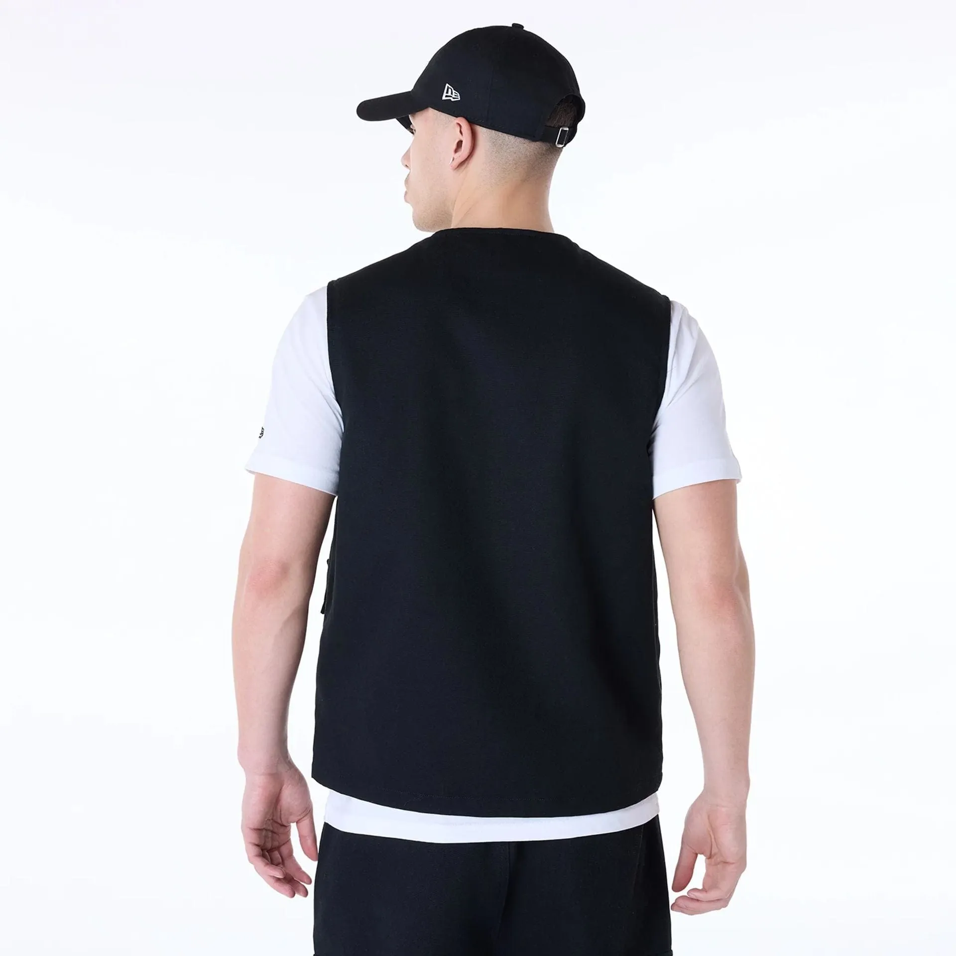 Minimalist purity New Era Essential Black Utility Vest