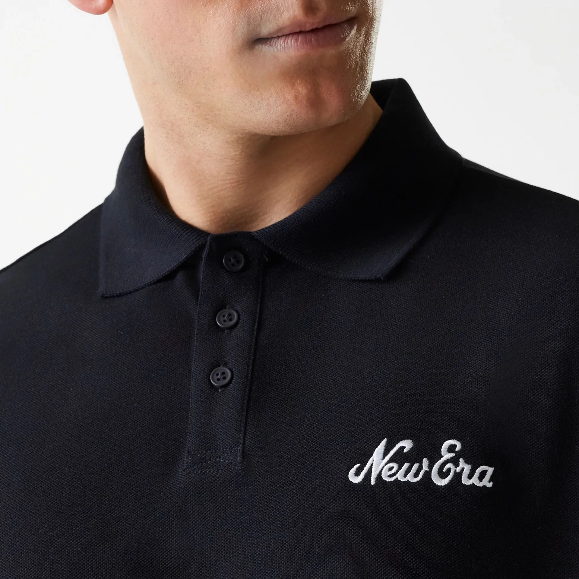 Chafe Free Armhole Tubular Knit Structure New Era Script Black Polo T-Shirt