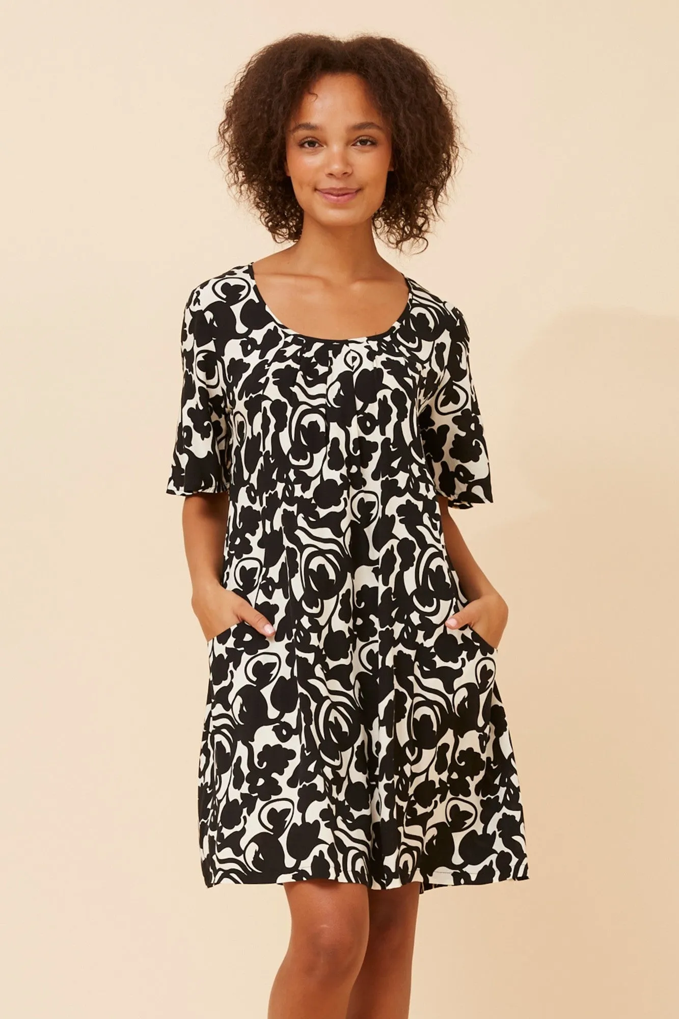 ANIKA ABSTRACT PRINT SHORT DRESS Compressible Chic Energy